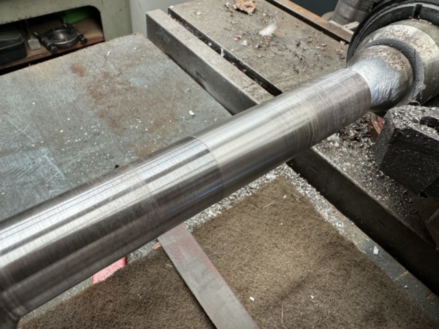 Metal sprayed shaft repair